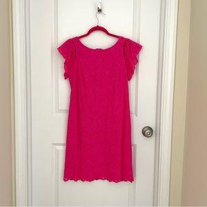 Eyelet sheath dress with pee a boo sleeve